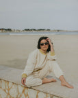 Matching neutral sweatsuit set for women.