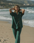 Women's green waffle knit shirt.