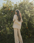Women's neutral waffle knit shirt.