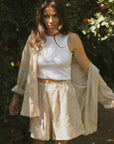 Striped matching shorts and top set for women.