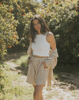 Striped matching shorts and top set for women.