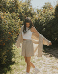Striped matching shorts and top set for women.