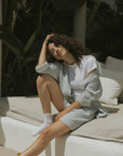 Striped matching shorts and top set for women.
