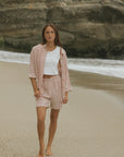 Striped matching shorts and top set for women.