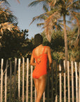 Red one piece swimsuit.