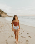 White, modest, high waisted bikini bottoms.