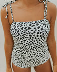 Cute modest one piece swimsuit, with ribbed texture and black and white cheetah print. Nursing Friendly