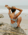 Cute modest one piece swimsuit, with ribbed texture and black and white cheetah print. Nursing Friendly