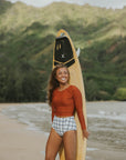 Orange long sleeve womens swimsuit top.
