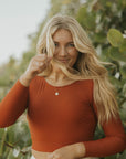 Cute modest active rust long sleeve tankini top.