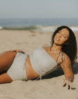 Full coverage gingham bikini top with adjustable ruching sides.