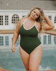 Women's dark green one piece swimsuit white trim