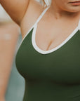 Sporty active one piece swimsuit forest green white trim