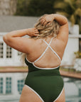Women's dark green one piece swimsuit white trim