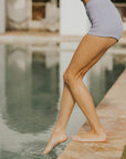 Lavender swimsuit bottoms textured tight fitting swim shorts for women