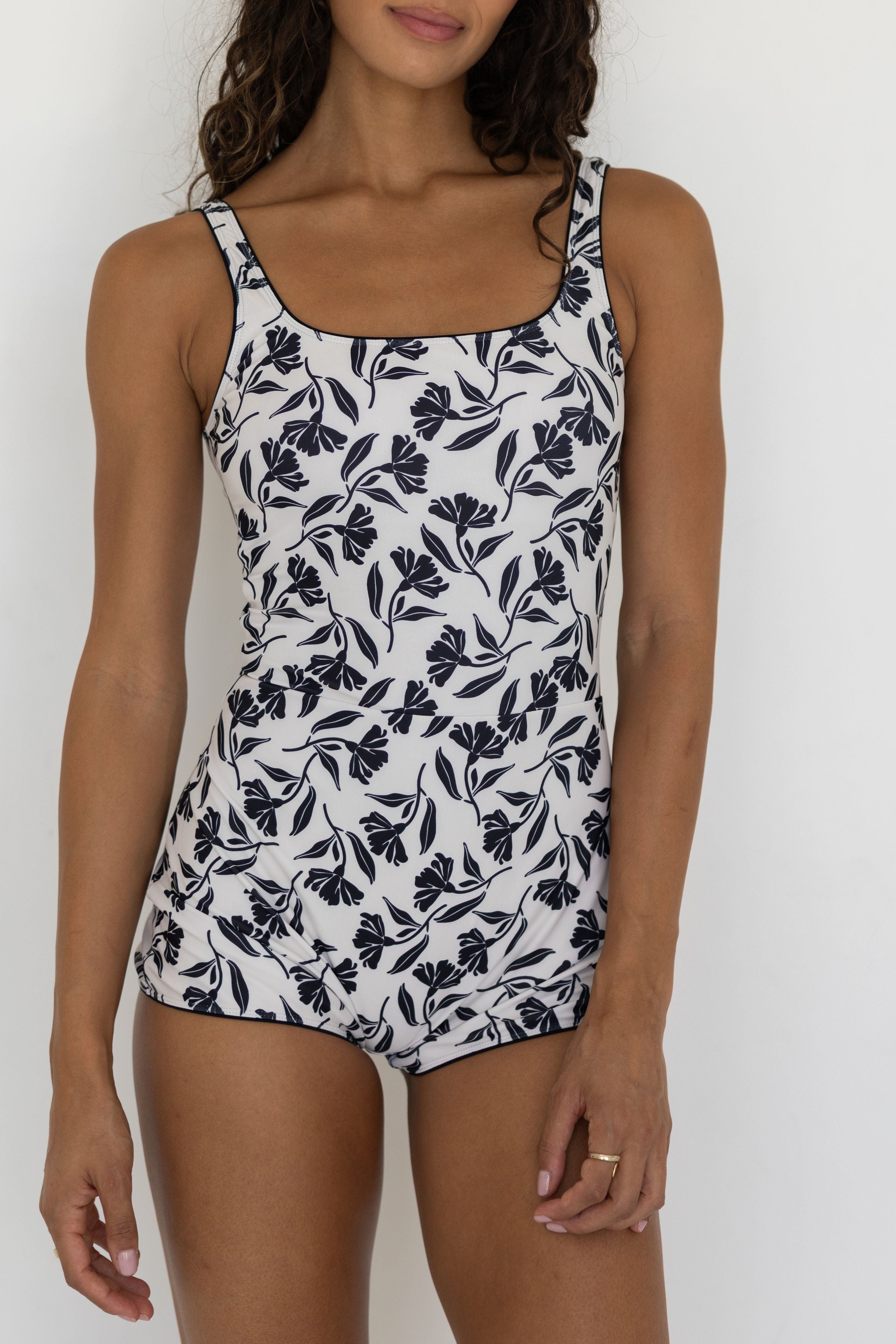 Aruba Bodysuit | White & Black Floral Open Back Swim Bodysuit with Shorts