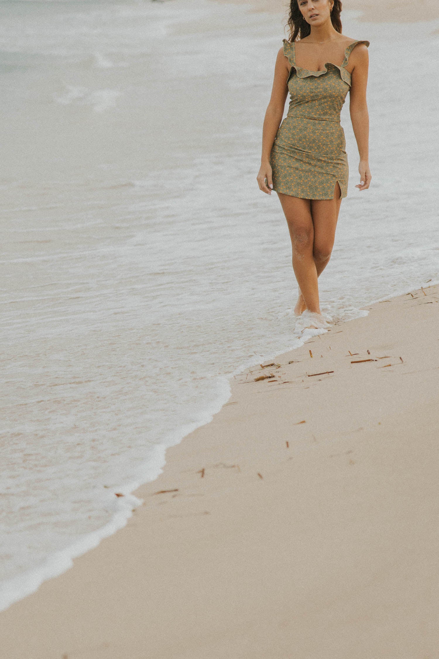 Full coverage green floral swimsuit with swim skirt