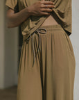 Stretchy and adjustable green pajama pant for women.