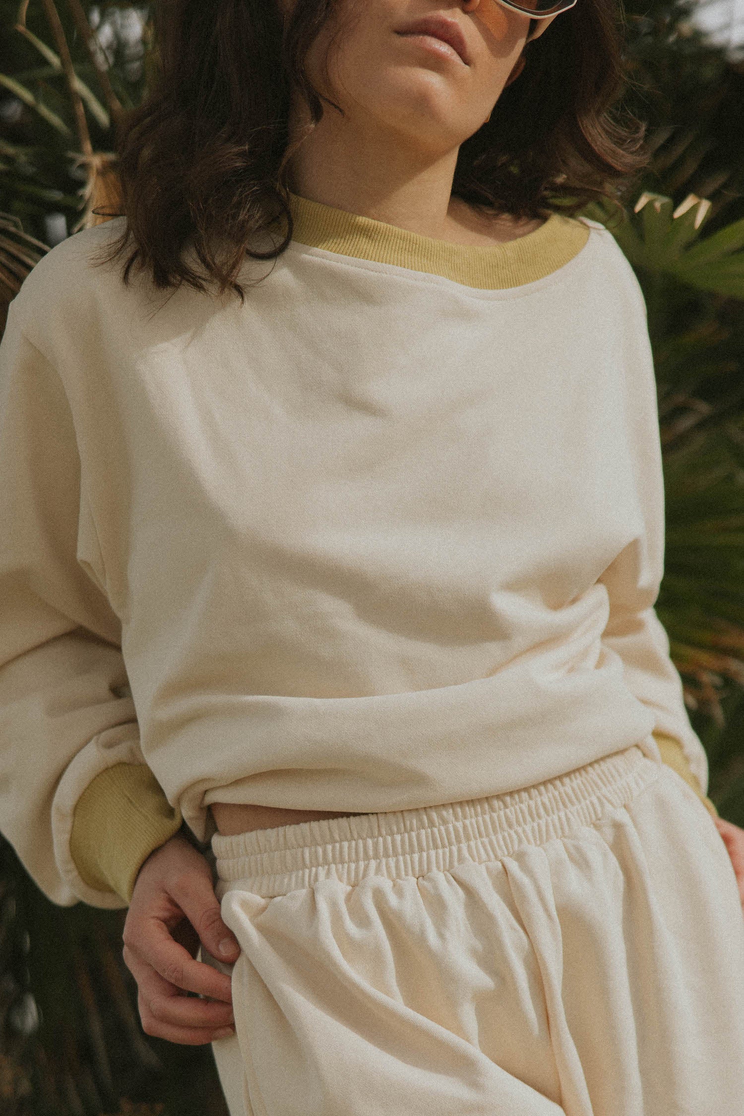 Matching neutral sweatsuit set for women.