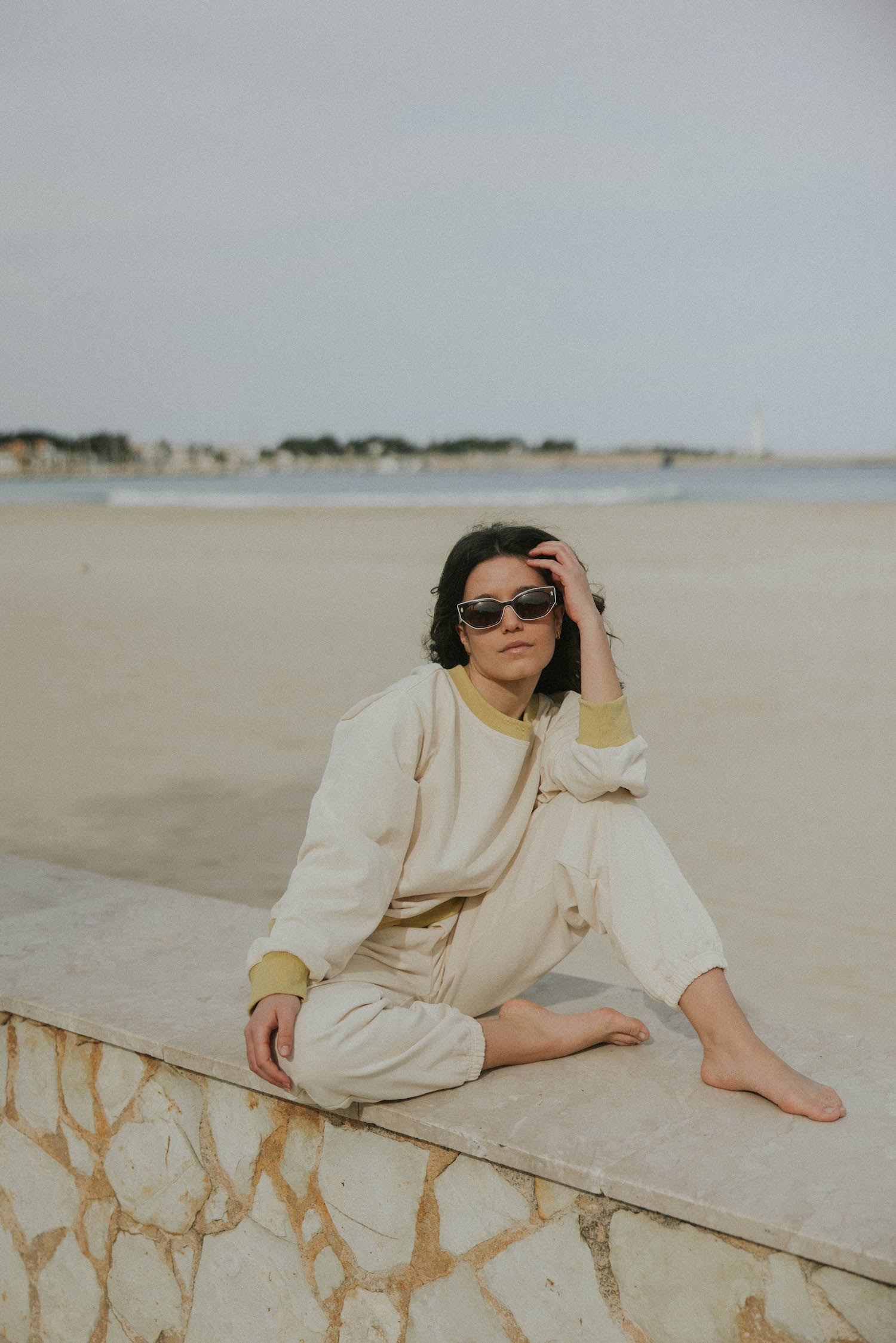 Matching neutral sweatsuit set for women.