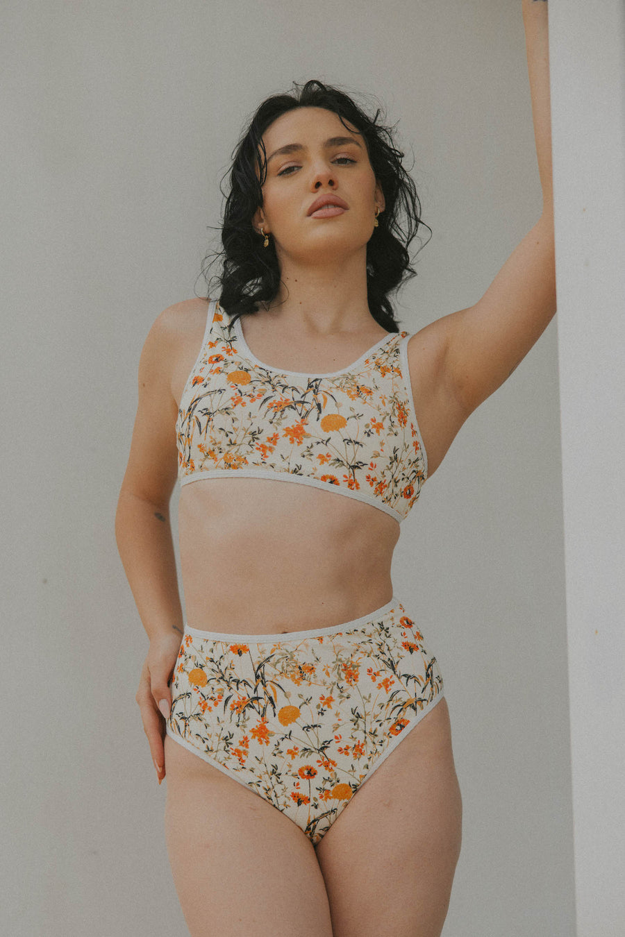 Neutral colored floral printed full coverage sporty bikini top and bottoms 