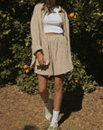 Striped matching shorts and top set for women.