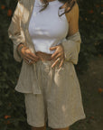 Striped matching shorts and top set for women.