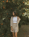 Striped matching shorts and top set for women.