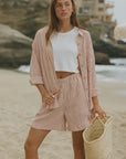 Striped matching shorts and top set for women.