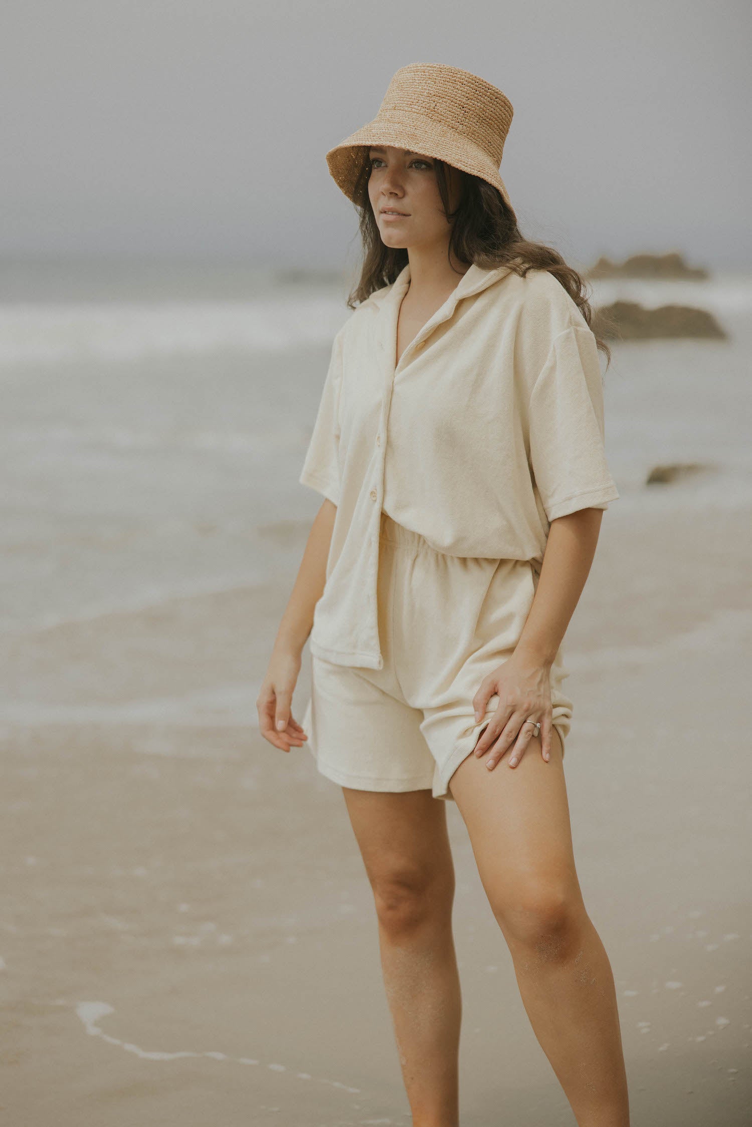 Neutral matching beachwear set for women.