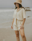 Neutral matching beachwear set for women.
