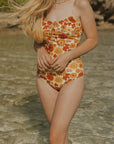 Retro floral modest one piece swimsuit with adjustable straps and front tie.  