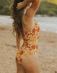Retro floral one piece swimsuit with adjustable straps. 