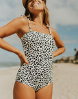 Cute modest one piece swimsuit, with ribbed texture and black and white cheetah print. Nursing Friendly 