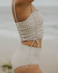 Full coverage gingham bikini top with adjustable ruching sides. 
