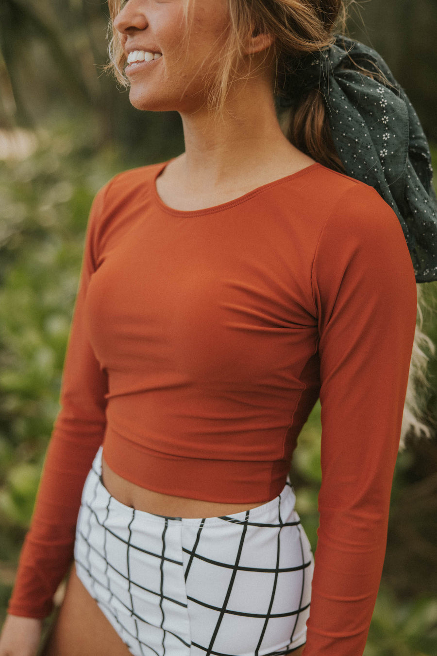 Cute modest orange long sleeve tankini top with full coverage bikini bottoms. 