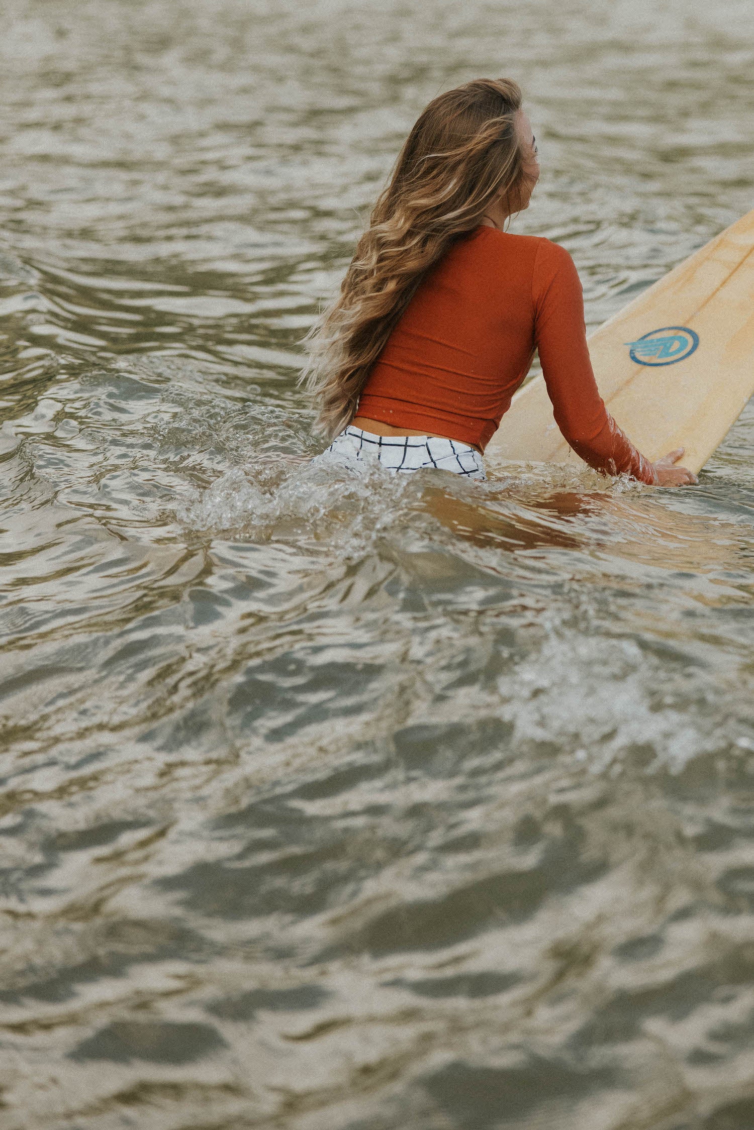 cute modest rust orange long sleeve swimsuit top. 