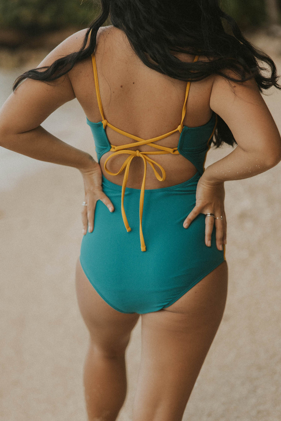 Cute modest aqua green one piece swimsuit with adjustable straps. 