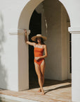 Dark orange two-piece ginger swimsuit for women