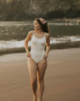 Cute modest white one piece swimsuit for bachelorettes party